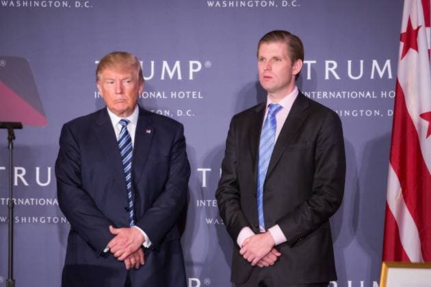 October 26, 2016 - Washington, DC, United States - In the grand ballroom of Trump International Hotel, (l-r), U.S. Presidential candidate Donald Trump, and his son Eric Trump, onstage in the grand ballroom for the grand opening ceremony for their family s latest property, Trump International Hotel - Old Post Office, in Washington, DC on October 26, 2016. The event was closed to the public, and included VIP guests and employees of Trump. Washington United States  - ZUMAn230 20161026_zaa_n230_560