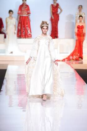 October 27, 2016 - Beijing, Beijing, China - Beijing,CHINA-October 27 2016: (EDITORIAL USE ONLY. CHINA OUT) ..A model shows a wedding dress of designer Tsaim Meiyue s collections at China Fashion Week in Beijing, October 27th, 2016. Beijing China  - ZUMAs145 20161027_zaa_s145_146