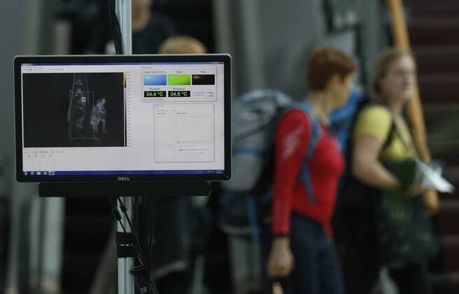 A working staff of Inspection and Quarantine Administration looks at the screen of a body temperature monitoring equipment at Yangon International Airport in Yangon, Myanmar, Oct. 28, 2016. A Zika case has been detected in Myanmar s Yangon, the state radio confirmed on Thursday. A 32-year-old pregnant foreign woman was detected on Thursday for positive for the Zika virus in Yangon. ) (zjy) MYANMAR-YANGON-ZIKA CASE DETECTION UxAung 