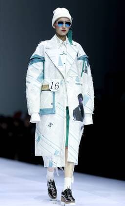 A model presents a creation at the HIKARI Cup 2016 China 3D Digital Fashion Design Contest during the China Fashion Week in Beijing, capital of China, Oct. 28, 2016. ) (ry) CHINA-BEIJING-FASHION WEEK (CN) ChenxJianli 