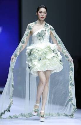 A model presents a creation at the HIKARI Cup 2016 China 3D Digital Fashion Design Contest during the China Fashion Week in Beijing, capital of China, Oct. 28, 2016. ) (ry) CHINA-BEIJING-FASHION WEEK (CN) ChenxJianli 