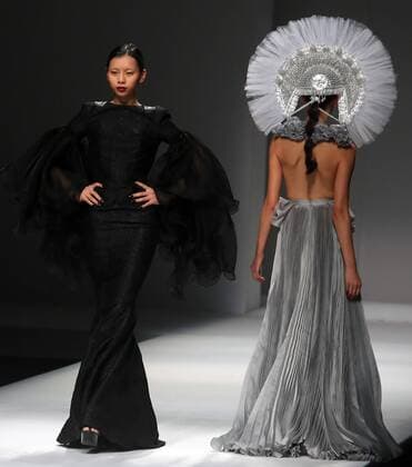 Chinese and European models wear clothing from the Maryma 2017 collection during China s international fashion week in Beijing on October 29, 2016. Chinese fashion designers are becoming an international force with both European and American fashion houses looking at the new, fresh Chinese clothing-minds as potential partners in future clothing brands.  PEK2016102908 STEPHENxSHAVER