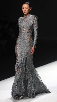 Chinese and European models wear clothing from the Maryma 2017 collection during China s international fashion week in Beijing on October 29, 2016. Chinese fashion designers are becoming an international force with both European and American fashion houses looking at the new, fresh Chinese clothing-minds as potential partners in future clothing brands.  PEK2016102912 STEPHENxSHAVER
