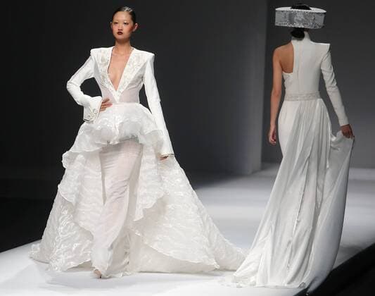 Chinese and European models wear clothing from the Maryma 2017 collection during China s international fashion week in Beijing on October 29, 2016. Chinese fashion designers are becoming an international force with both European and American fashion houses looking at the new, fresh Chinese clothing-minds as potential partners in future clothing brands.  PEK2016102917 STEPHENxSHAVER