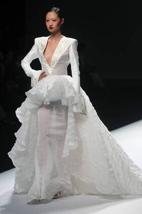 Chinese and European models wear clothing from the Maryma 2017 collection during China s international fashion week in Beijing on October 29, 2016. Chinese fashion designers are becoming an international force with both European and American fashion houses looking at the new, fresh Chinese clothing-minds as potential partners in future clothing brands.  PEK2016102918 STEPHENxSHAVER