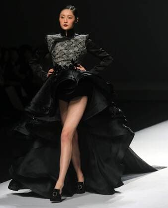 Chinese and European models wear clothing from the Maryma 2017 collection during China s international fashion week in Beijing on October 29, 2016. Chinese fashion designers are becoming an international force with both European and American fashion houses looking at the new, fresh Chinese clothing-minds as potential partners in future clothing brands.  PEK2016102934 STEPHENxSHAVER