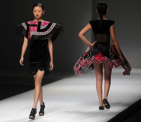 Chinese and European models wear clothing from the Maryma 2017 collection during China s international fashion week in Beijing on October 29, 2016. Chinese fashion designers are becoming an international force with both European and American fashion houses looking at the new, fresh Chinese clothing-minds as potential partners in future clothing brands.  PEK2016102936 STEPHENxSHAVER
