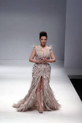BEIJING, CHINA - OCTOBER 29: Actress Kathy Chow showcases designs on the runway at Jusere collection during the Mercedes-Benz China Fashion Week Spring Summer 2017 at 751D Park on October 29, 2016 in Beijing, China.  CFP494621756