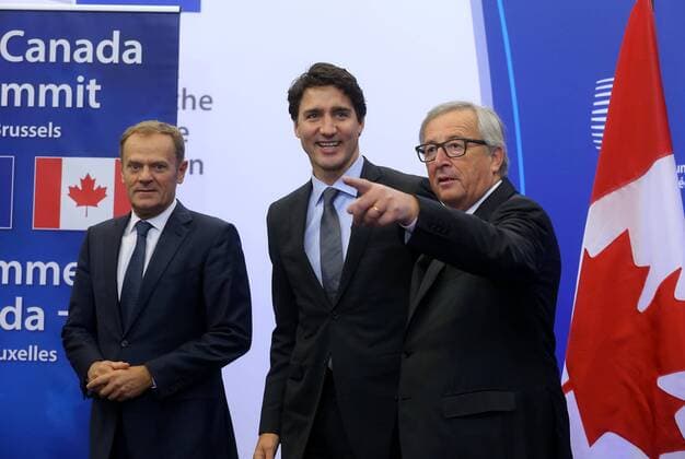European Council President Donald Tusk, Canadian Prime Minister Justin Trudeau and European Commission President Jean-Claude Juncker pictured during the EU-Canada summit meeting, Sunday 30 October 2016, at the European Union headquarters in Brussels. EU leaders and Canada will sign at Today s summit the Comprehensive Economic and Trade Agreement (CETA). The signing of the treaty was delayed by the refusal of the Belgian Walloon and Brussels Region.  NICOLASxMAETERLINCK 04969043
