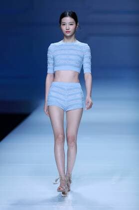BEIJING, CHINA - OCTOBER 30: A model showcases designs on the runway at Snow Lotus collection by Tanya Wang during the Mercedes-Benz China Fashion Week Spring Summer 2017 at Banquet Hall of Beijing Hotel on October 30, 2016 in Beijing, China.  CFP494679703