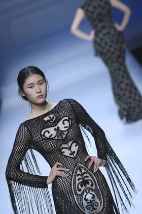 BEIJING, CHINA - OCTOBER 30: A model showcases designs on the runway at Snow Lotus collection by Tanya Wang during the Mercedes-Benz China Fashion Week Spring Summer 2017 at Banquet Hall of Beijing Hotel on October 30, 2016 in Beijing, China.  CFP494701512