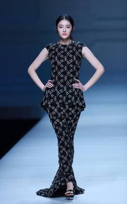 BEIJING, CHINA - OCTOBER 30: A model showcases designs on the runway at Snow Lotus collection by Tanya Wang during the Mercedes-Benz China Fashion Week Spring Summer 2017 at Banquet Hall of Beijing Hotel on October 30, 2016 in Beijing, China.  CFP494679699