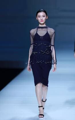 BEIJING, CHINA - OCTOBER 30: A model showcases designs on the runway at Snow Lotus collection by Tanya Wang during the Mercedes-Benz China Fashion Week Spring Summer 2017 at Banquet Hall of Beijing Hotel on October 30, 2016 in Beijing, China.  CFP494679693