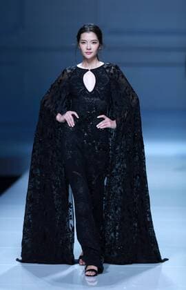 BEIJING, CHINA - OCTOBER 30: A model showcases designs on the runway at Snow Lotus collection by Tanya Wang during the Mercedes-Benz China Fashion Week Spring Summer 2017 at Banquet Hall of Beijing Hotel on October 30, 2016 in Beijing, China.  CFP494679701