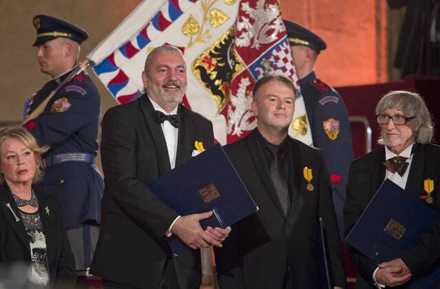 Czech President Milos Zeman bestowed state decorations on personalities, some of them in memoriam, on Friday, October 28, in Prague, Czech Republic, on the occasion of the national holiday marking the establishment of the independent Czechoslovak state in 1918. Juraj Jakubisko, right, and singer Daniel Hulka, second from left, receive the Medals of Merit for contribution to the state in the field of art, and Petr Chmela, receives the Medals of Merit for contribution to the state in the field of economy. (CTKxPhoto VitxSimanek) CTKPhotoP201610281115601  VIS 013