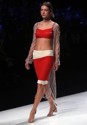 Chinese and European models wear clothing from the Lotus 2017 collection during China s international fashion week in Beijing on October 31, 2016. Chinese fashion designers are becoming an international force with both European and American fashion houses looking at the new, fresh Chinese clothing-minds as potential partners in future clothing brands.  PEK2016103116 STEPHENxSHAVER