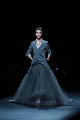 BEIJING, CHINA - NOVEMBER 01: Actress Che Xiao showcases designs on the runway at AM.IXAM collection by Ma Ying during the Mercedes-Benz China Fashion Week Spring Summer 2017 at Banquet Hall of Beijing Hotel on November 1, 2016 in Beijing, China.  CFP494828327