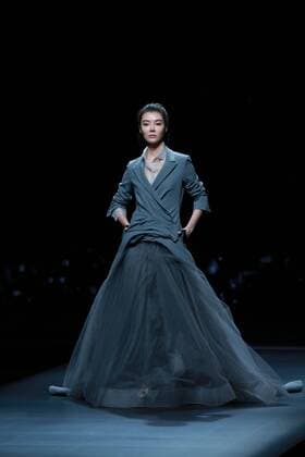 BEIJING, CHINA - NOVEMBER 01: Actress Che Xiao showcases designs on the runway at AM.IXAM collection by Ma Ying during the Mercedes-Benz China Fashion Week Spring Summer 2017 at Banquet Hall of Beijing Hotel on November 1, 2016 in Beijing, China.  CFP494828349