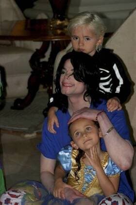 June 27, 2009 - Los Angeles, California, U.S. - (Exact date and location unknown) MICHAEL JACKSON with his son MICHAEL JOSEPH JACKSON, JR. AKA PRINCE MICHAEL, behind, and his daughter PARIS MICHAEL KATHERINE JACKSON on his lap dressed in costumes. - ZUMAz03_ 20090627_zaf_z03_020