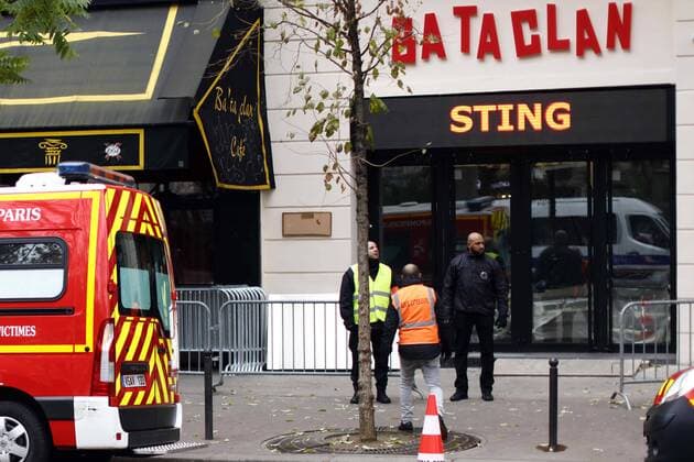 November 12, 2016 - Paris, France - French policemen and security officers stand guard at the entrance of the Bataclan concert hall in Paris on November 12, 2016, a few hours before the reopening concert by British musician Sting to mark the first anniversary of the November 13 Paris attacks. Le Bataclan, the live music venue at the centre of the 13 Nov 2015 Paris terror attacks, reopens for the first time since the tragedy with a performance by Sting on the eve of the 1st anniversary. Paris France  - ZUMAn230 20161112_zaa_n230_016
