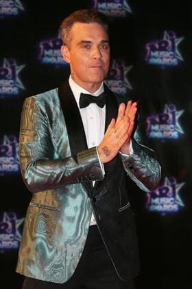 213403 Francois Glories Starface 2016-11-12 Cannes France NRJ Music Awards 2016. FRANCE Cannes 12-11-2016. The English singer Robbie Williams and the French singer Jenifer arrive on the red carpet for 18th NRJ Music Awards in Cannes (South of France).  Copyright: xFrancoisxGloriesx xStarfacex STAR_213403_189