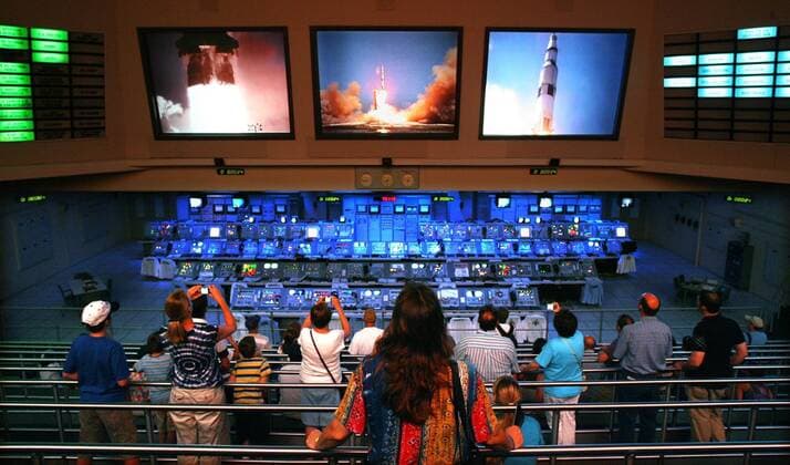 SCOTT KEELER Times.OT_3066717_KEEL_SPACE_ 3 OF 9.(05 26 2009 COCOA BEACH ) 3. Visitors at the Kennedy Space Center view films of the launch of the Apollo 7 mission in the Saturn V Center launch room. Apollo 7 (October 11-22, 1968) was the first manned mission in the Apollo program to be launched. It was an eleven-day Earth-orbital mission carrying astronauts Walter M. Schirra, Donn F. Eisele, and R. Walter Cunningham. SCOTT KEELER, Times - ZUMAs70_ 20090710_zaf_s70_051