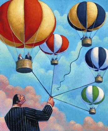 Geschäftsmann hält Hei§luftballons  JonathanxMcHugh 11390023