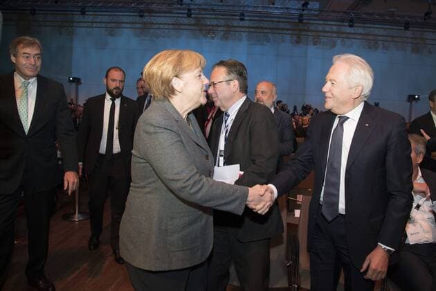 November 15, 2016 - Berlin, Germany - German Chancellor Angela Merkel (L) shake hands with CEO of Deutsche Bahn Ruediger Grube (R) before a a BDA (Bundesvereinigung der Deutschen Arbeitgeberverbaende - Federal Union of the German Employers Associations) meeting in Berlin, Germany on November 15, 2016. Berlin Germany  - ZUMAn230 20161115_zaa_n230_369