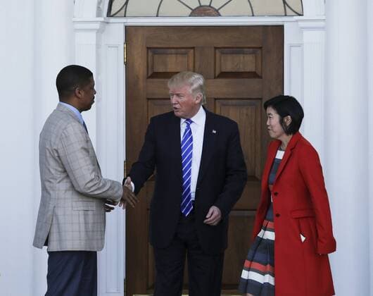 President-elect Donald Trump (C) greets Mayor of Sacramento, California, Kevin Johnson (L) and former chancellor of Washington, DC public schools Michelle Rhee (R), at the clubhouse of Trump International Golf Club, November 19, 2016 in Bedminster Township, New Jersey. Pool photo by Aude Guerrucc  TPX20161119215 AUDExGUERRUCCI