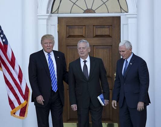 President-elect Donald Trump (L) and Vice President-elect Mike Pence (R) pose with General James Mattis (C) at the clubhouse of Trump International Golf Club, November 19, 2016 in Bedminster Township, New Jersey. Pool photo by Aude Guerrucc  TPX20161119220 AUDExGUERRUCCI