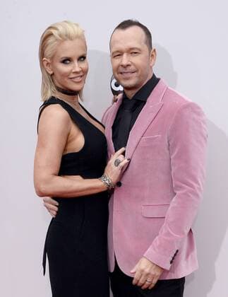 Actress Jenny McCarthy (L) and recording artist Donnie Wahlberg arrive for the 2016 American Music Awards held at Microsoft Theater in Los Angeles on November 20, 2016.  LAP20161120129 JIMxRUYMEN