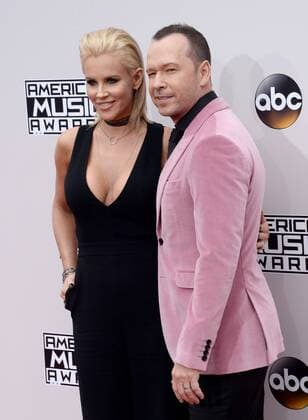 Actress Jenny McCarthy (L) and recording artist Donnie Wahlberg arrive for the 2016 American Music Awards held at Microsoft Theater in Los Angeles on November 20, 2016.  LAP20161120127 JIMxRUYMEN