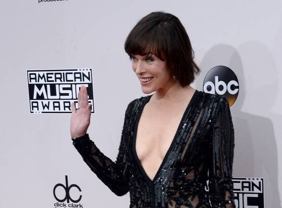 Actress Milla Jovovich arrives for the 2016 American Music Awards held at Microsoft Theater in Los Angeles on November 20, 2016.  LAP20161120199 JIMxRUYMEN