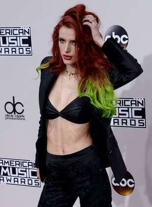Actress Bella Thorne arrives for the 2016 American Music Awards held at Microsoft Theater in Los Angeles on November 20, 2016.  LAP20161120218 JIMxRUYMEN