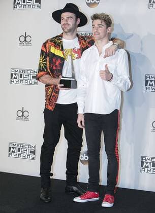 November 20, 2016 - Los Angeles, California, U.S - Alex Pall (L) and Drew Taggart of The Chainsmokers pose with the Favorite EDM Artist award in the Press Room of the 2016 American Music Awards held on Sunday, November 20, 2016 at the Microsoft Theatre in Los Angeles, California. Los Angeles U.S. - ZUMAp124 20161120_zaa_p124_251