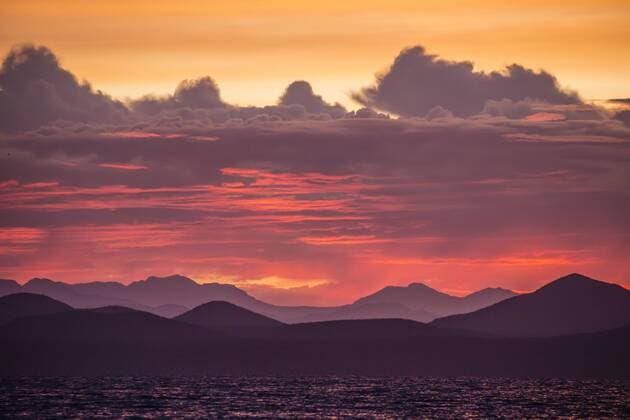 Intense clouds and sunset over Baja Peninsula from Isla Ildefonso, Baja California Sur, Mexico, North America Copyright: MichaelxNolan 1112-2964