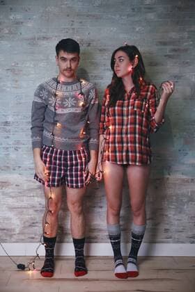 Bored young couple with fairy lights model released Symbolfoto  RTBF00517