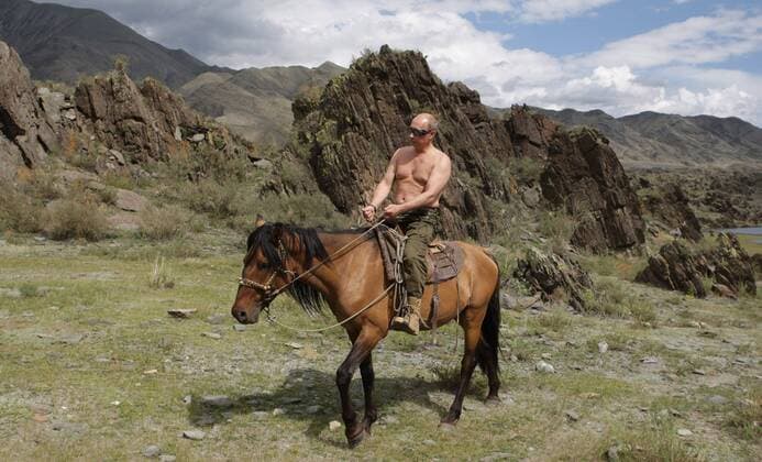 August 4, 2009 - Republic of Tyva, Russia - Shirtless Russian Prime Minister VLADIMIR PUTIN rides a horse while on vacation.  - ZUMAe47_ 20090803_tkf_e47_010
