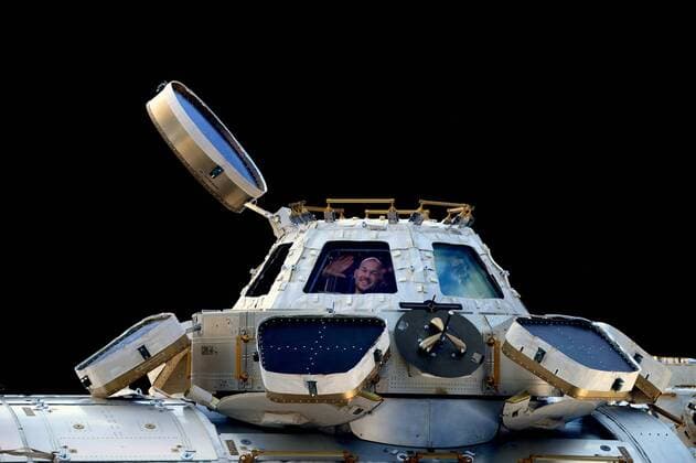November 2, 2014 - Earth Orbit - NASA International Space Station Expedition 41 crew member German astronaut Alexander Gerst of the European Space Agency waves from the window of the ISS Cupola November 2, 2014 in Earth orbit. Earth Orbit - ZUMAp138 20141102_zaa_p138_008