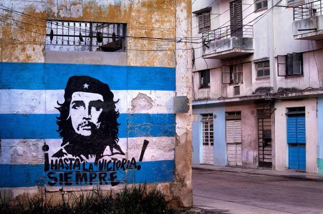 Mural of Che Guevara and the Cuba, West Indies, Central American flag painted on a wall, Havana, Cuba, West Indies, Central America Copyright: LeexFrost 321-5329