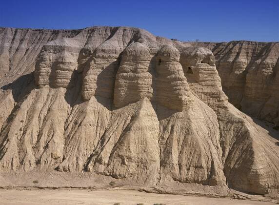 Archaeological site of Qumran where Dead Sea scrolls discovered in caves in cliffs, Judean Desert, Israel, Middle East Copyright: EitanxSimanor 557-2155