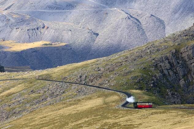 Steam train on route between Llanberis and the summit of Mount Snowdon in Snowdonia National Park, Gwynedd, Wales, United Kingdom, Europe Copyright: GrahamxLawrence Editorial Use Only 663-822