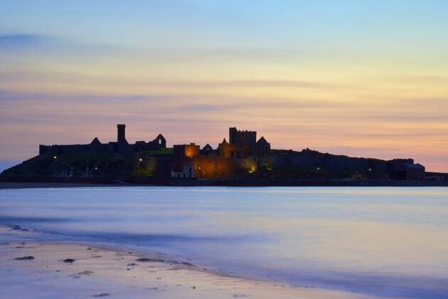 Peel Castle at dusk, St. Patrick s Isle, Isle of Man, Europe Copyright: NeilxFarrin 1126-876