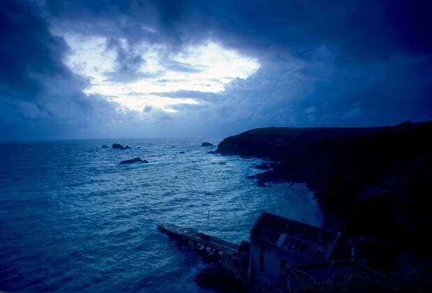 Dusk at Lizard Point in Cornwall, South West England. In the foreground is the old lifeboat station. Copyright: TimxGraham 1161-1050