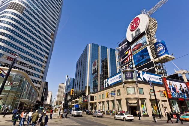 Intersection of Young Street and Dundas Street, showing part of Eaton Center, as viewed from Dundas Square, Toronto, Ontario, Canada, North America Copyright: StuartxDee 821-171