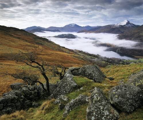 Mist over Llyn Gwynant and Snowdonia Mountains, Snowdonia National Park, Conwy, Wales, United Kingdom, Europe Copyright: StuartxBlack 846-49