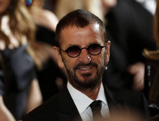 December 4, 2016 - Washington, District of Columbia, United States of America - Musician and former Beatles member Ringo Starr leaves after United States President Barack Obama delivered remarks at the Kennedy Center Honors Reception in the East Room of the White House, December 4, 2016, Washington, DC. The 2016 honorees are: Argentine pianist Martha Argerich; rock band the Eagles; screen and stage actor Al Pacino; gospel and blues singer Mavis Staples; and musician James Taylor..Credit: Pool via CNP Washington United States of America - ZUMAs152 20161204_zaa_s152_028