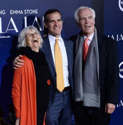 Mayor Eric Garcetti (C) and his father, former L.A. district attorney Gil Garcetti and mother Sukey Garcetti attend the premiere of the motion picture musical comedy La La Land at Mann Village Theater in the Westwood section of Los Angeles on December 6, 2016. Storyline: A jazz pianist falls for an aspiring actress in Los Angeles.  LAP2016120629 JIMxRUYMEN