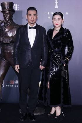 BEIJING, CHINA - DECEMBER 07: Actor Vincent Zhao Wenzhuo and wife Zhang Danlu pose on the red carpet of the 13th Man At His Best Award at the Worker s Stadium on December 7, 2016 in Beijing, China.  CFP496717247