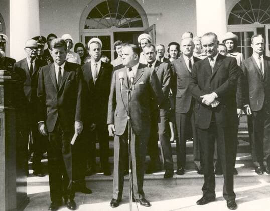 October 10, 1963 - Washington, District of Columbia, United States of America - NASA Administrator James E. Webb (center) cites the space achievements of the Project Mercury Astronauts who received the 1963 Collier Trophy Award in a ceremony held at the White House on October 10, 1963. President John F. Kennedy (left) and Vice President Lyndon Johnson accompanied Webb at the ceremony. Five of the Mercury Seven astronauts are visible in the row behind James Webb. They are (starting from JFK s left): Alan Shepard, Donald Deke Slayton, John Glenn, Virgil Gus Grissom, and Scott Carpenter..Credit: NASA via CNP Washington United States of America - ZUMAs152 19631010_zaa_s152_001